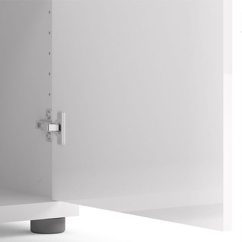 Close-up of a white cabinet with a hinge and foot on a white background