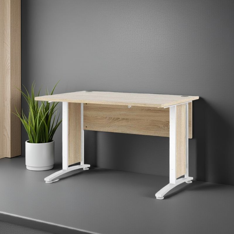 Wooden desk with white legs against a gray wall