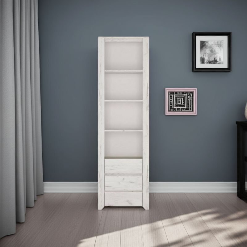 Tall white bookshelf against a gray wall with framed pictures.
