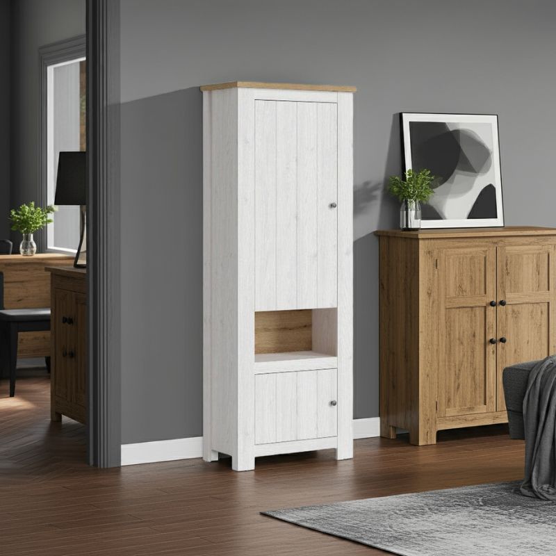 Tall white cabinet and a wooden dresser against a gray wall.