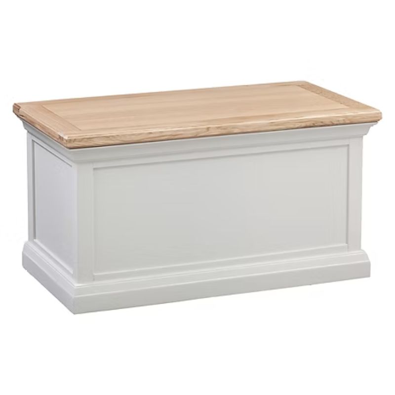 White wooden storage chest with a natural wood top on a white background