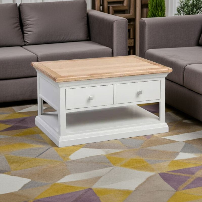 Coffee table with wooden top and white base in a living room setting