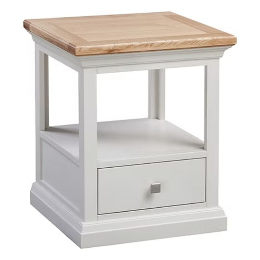 White side table with a wooden top on a white background