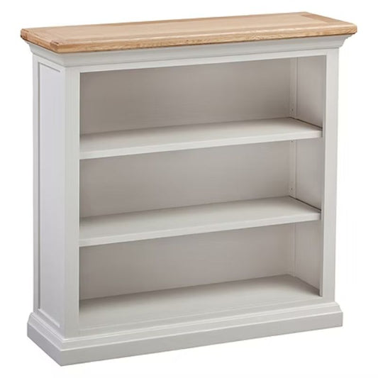 White bookshelf with a wooden top.