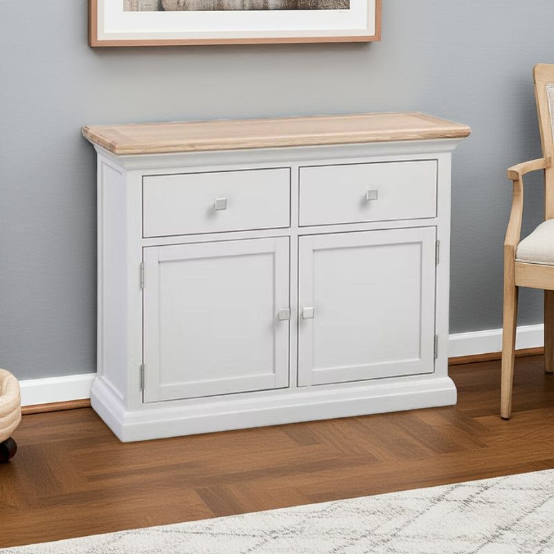 White cabinet with wooden top in a room setting