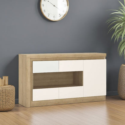 Wooden entertainment console against a gray wall with a clock and plant.