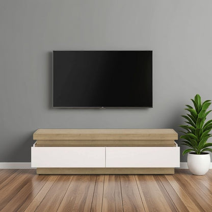 Modern living room with a flat-screen TV mounted on the wall above a wooden entertainment console.