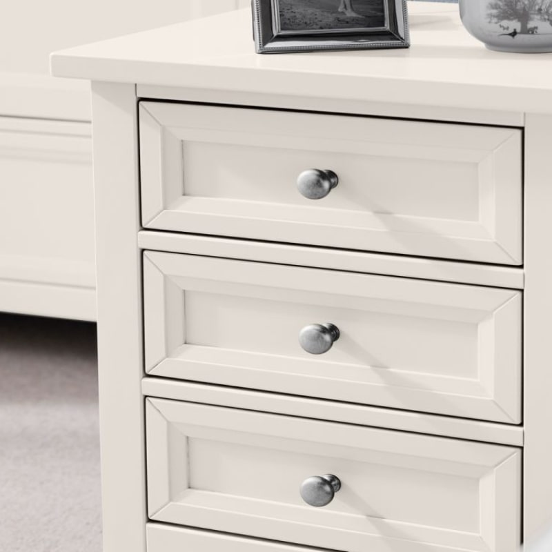 JULIAN BOWEN MAINE Surf White Bedside Cabinet w/ 3 Drawers featuring a panelled design and pewter handles. Ideal for bedroom storage.