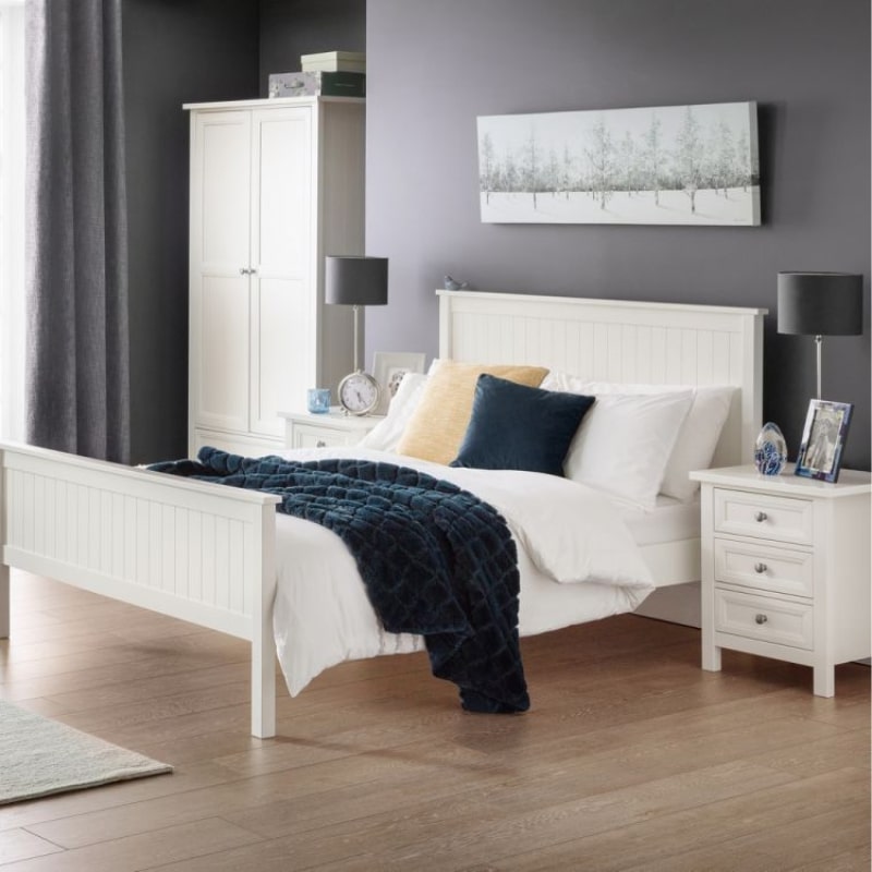 JULIAN BOWEN MAINE Surf White Bedside Cabinet w/ 3 Drawers featuring a panelled design and pewter handles. Ideal for bedroom storage.