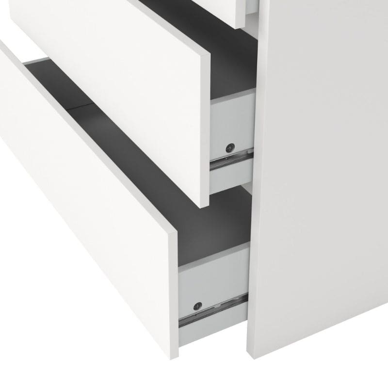 White dresser with three drawers on a white background