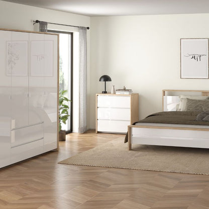 Wooden dresser with white drawers on a white background