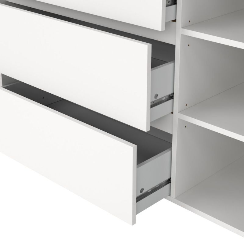 White storage unit with open shelves on a white background