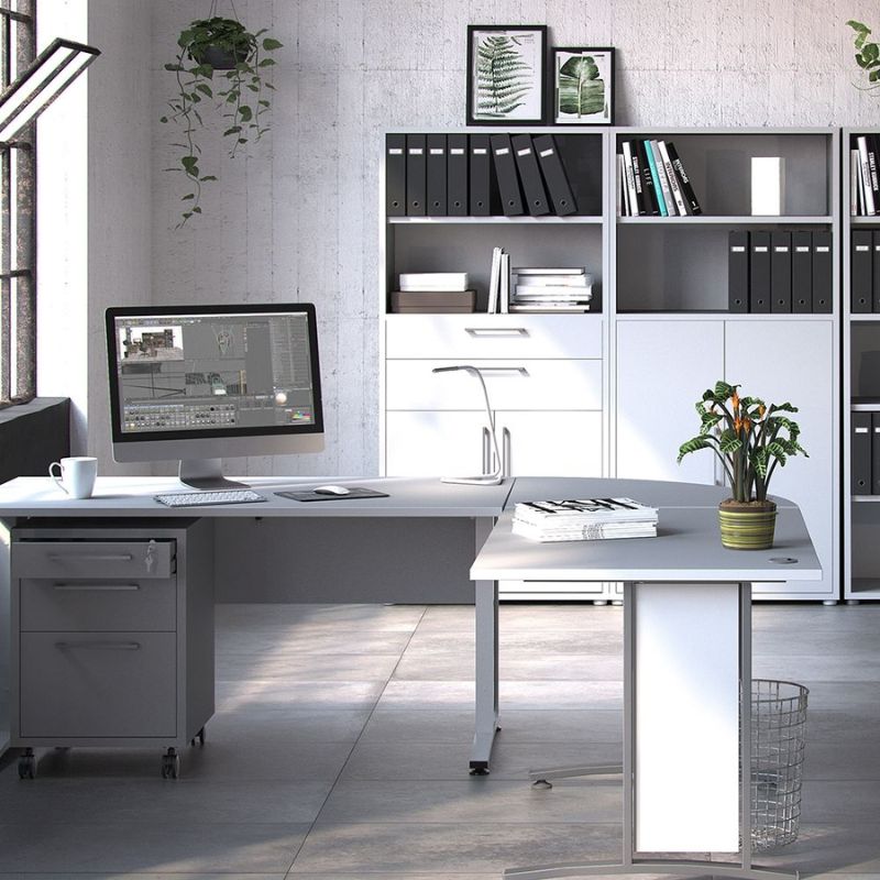 Modern office setup with a desk, computer, and bookshelf.