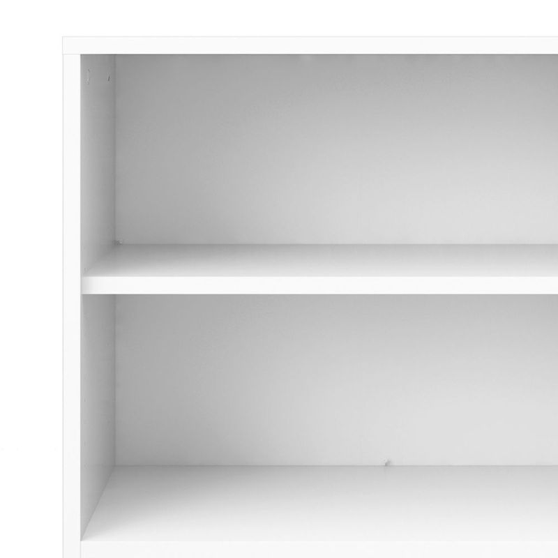 White bookshelf with two shelves on a white background