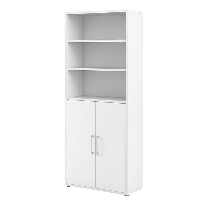 White bookshelf with two open shelves and a closed cabinet door on a white background