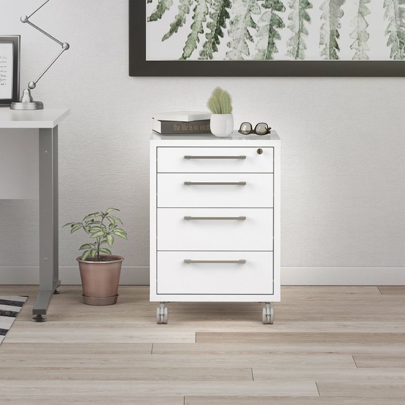 White filing cabinet with drawers in a room with a desk and plants.