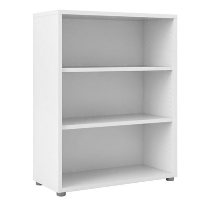 White bookshelf with three shelves on a white background