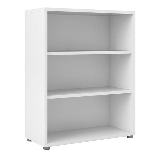 White bookshelf with three shelves on a white background