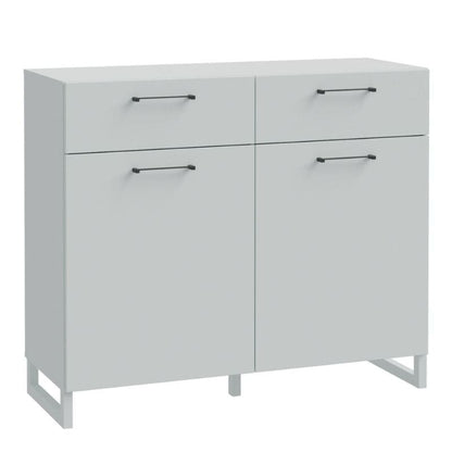White cabinet with four doors and handles on a white background