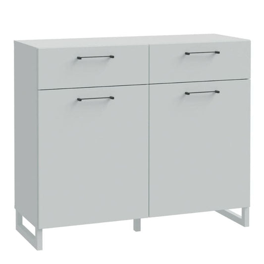 White cabinet with four doors and handles on a white background