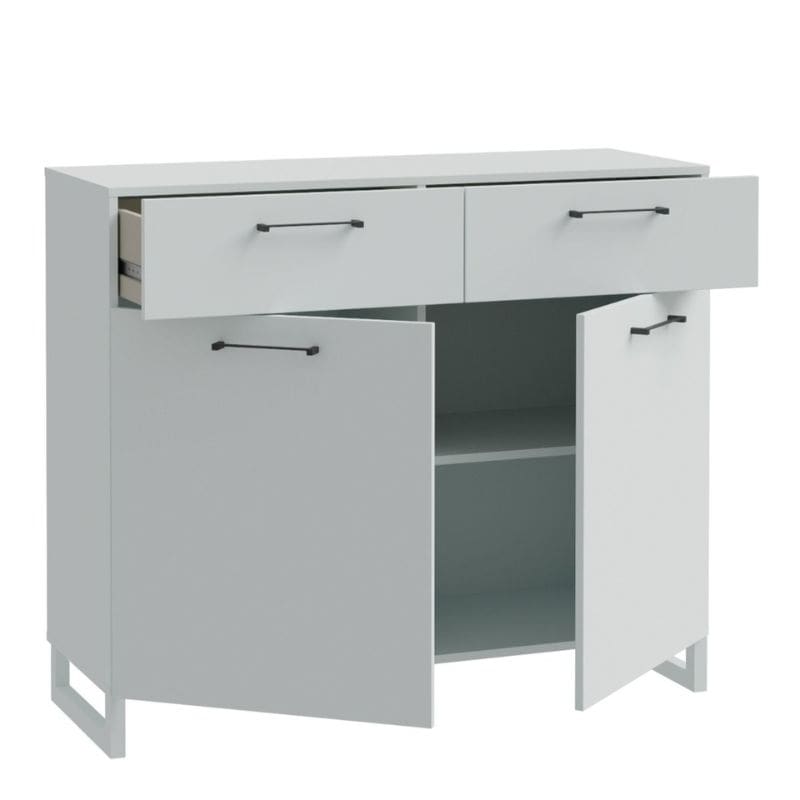 Gray sideboard with drawers and a door on a white background
