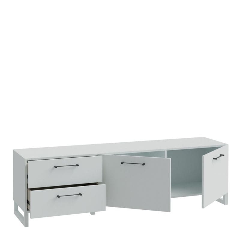 White entertainment console with drawers and open door on a white background