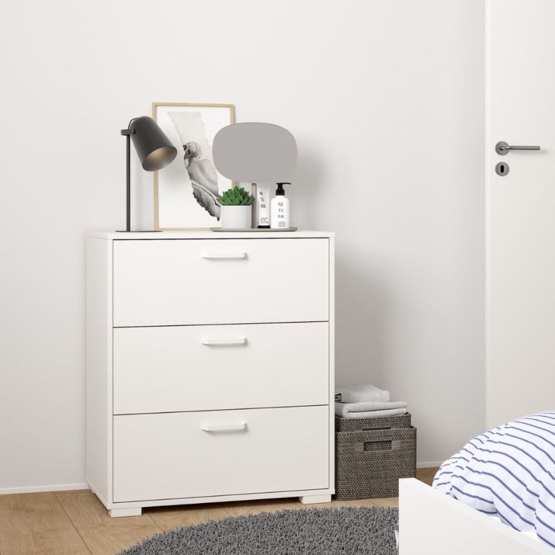 White dresser with decorative items in a bedroom setting