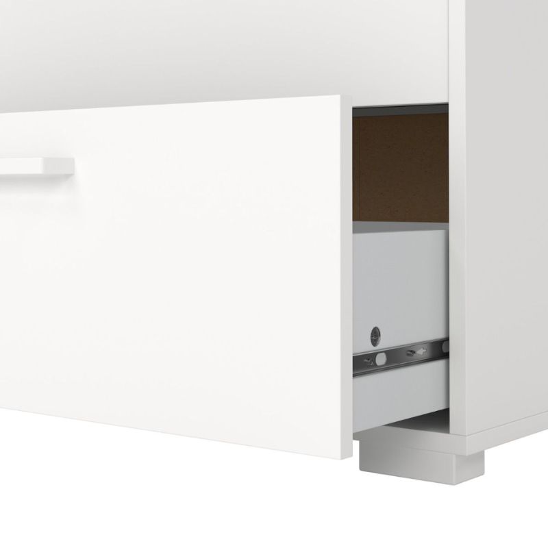 White dresser with a pull-out drawer on a white background