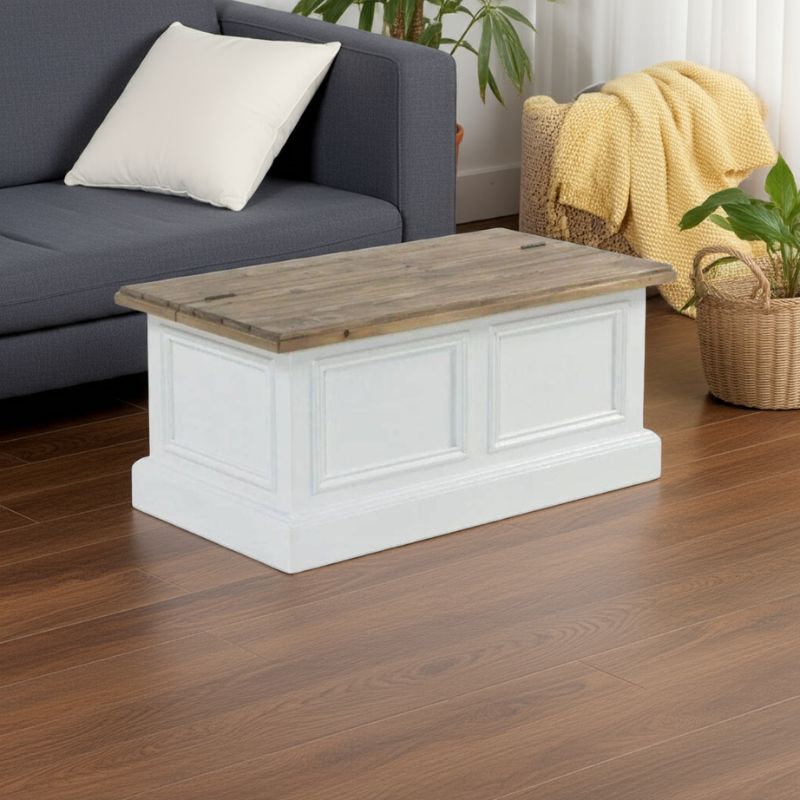 White storage bench with wooden top in a living room setting