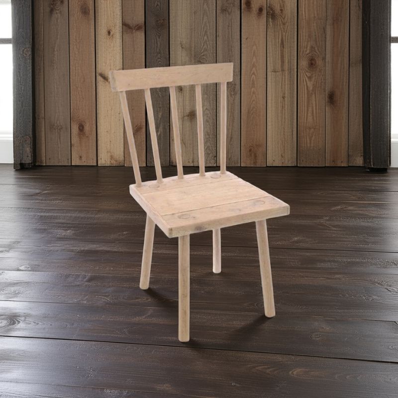Wooden chair against a wooden paneled wall