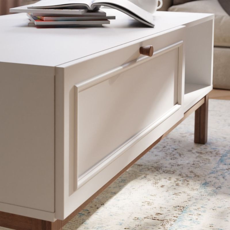 White coffee table with a drawer in a living room setting