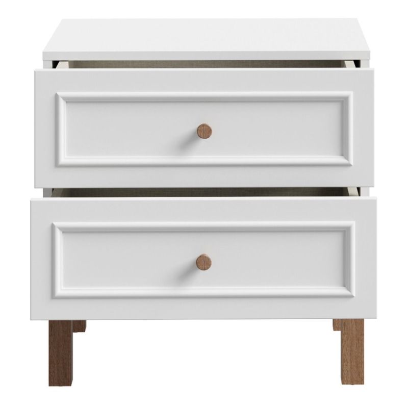 White nightstand with two drawers and wooden knobs on a white background