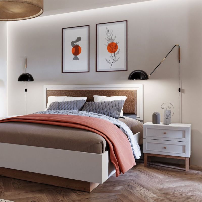 Modern bedroom with a bed, nightstand, and wall art.