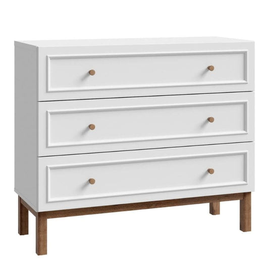 White dresser with wooden legs on a white background