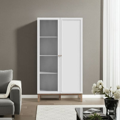 White glass-fronted display cabinet in a living room setting with a gray sofa and decorative items.