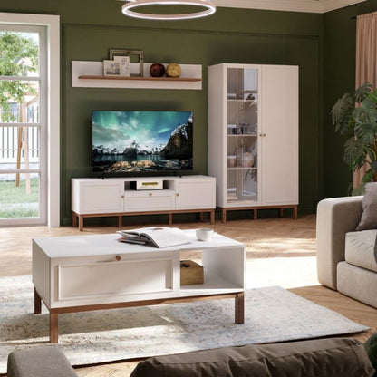 Modern living room with a TV, coffee table, and shelves.