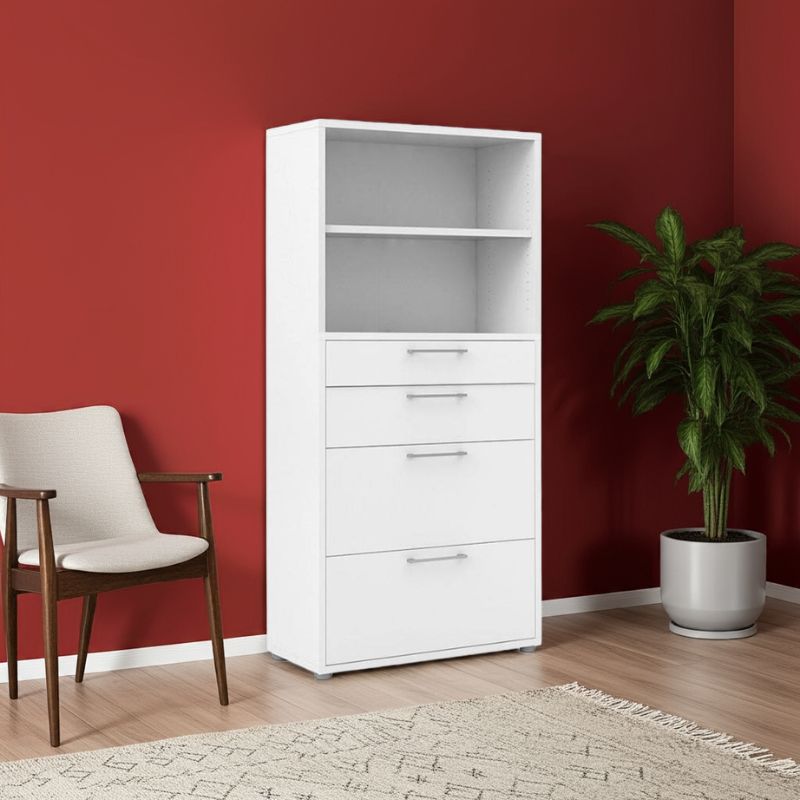 White bookshelf with drawers against a red wall with a chair and plant.