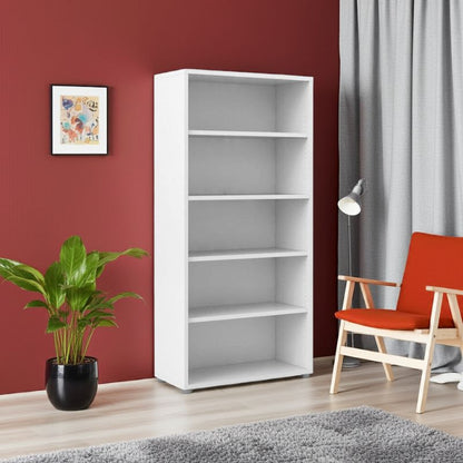 White bookshelf in a room with a red wall, plant, and chair.