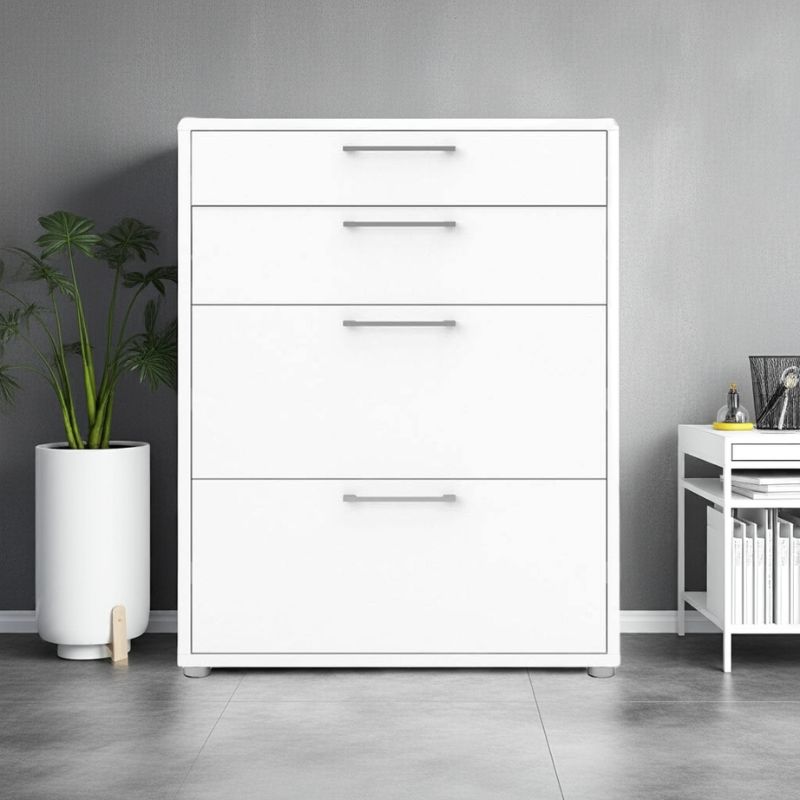 White dresser with four drawers in a room with a plant and small table.
