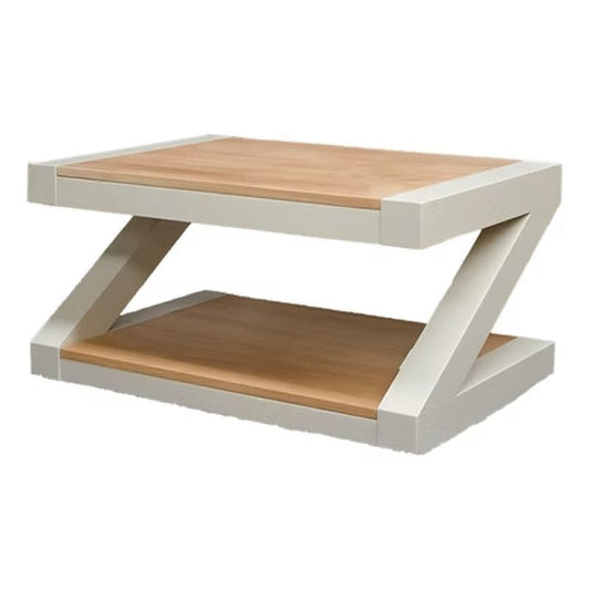 Modern coffee table with wooden top and white base.