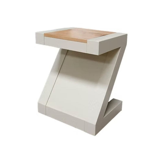 Modern side table with a wooden top.