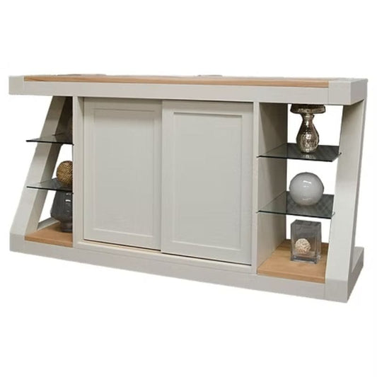 White entertainment console with wooden accents and shelves on a white background