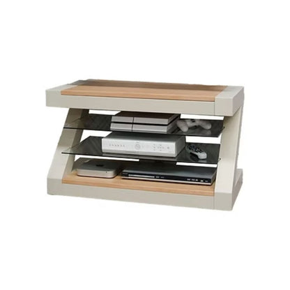 Modern entertainment console with wooden top and shelves.