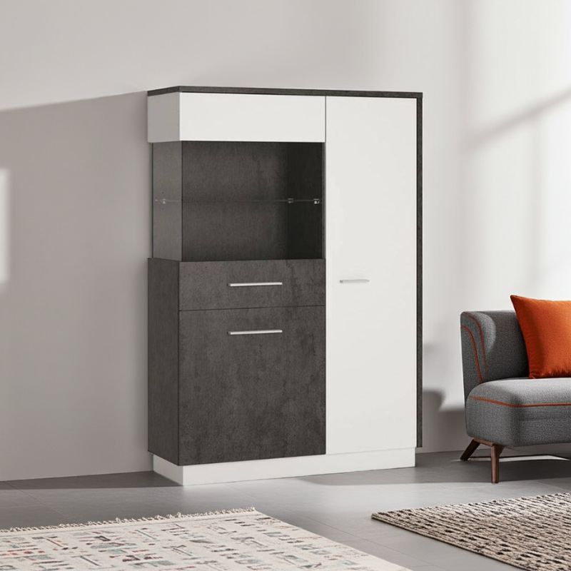 Tall white and gray cabinet in a room with a sofa and rug.